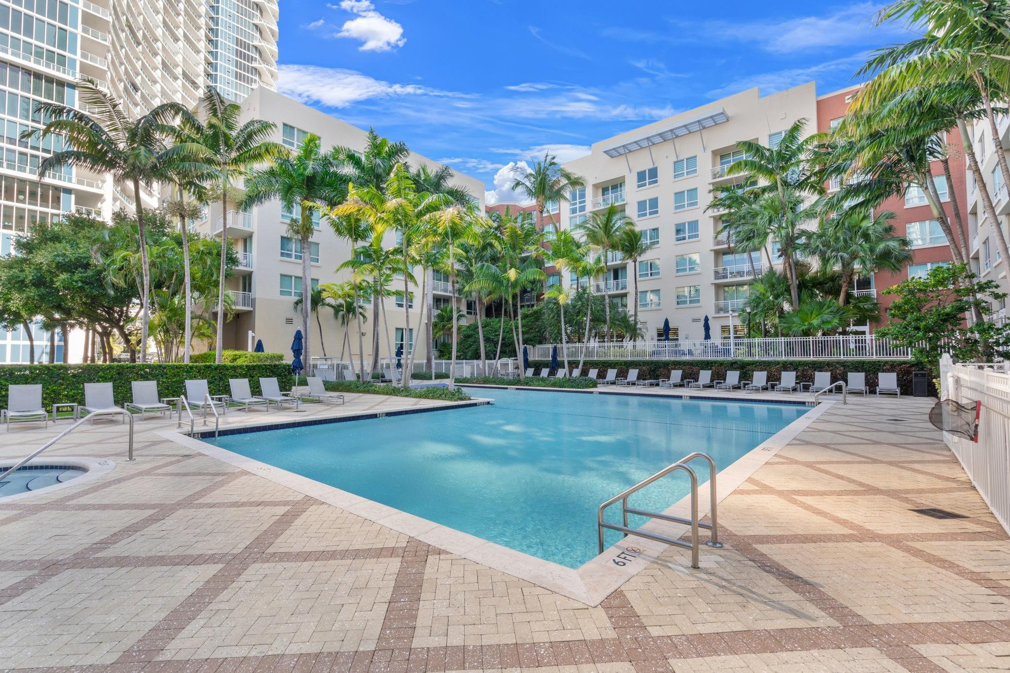 2001 Biscayne Boulevard, Unit 2303 Miami, FL 33137 - Photo 33 of 36 a view of a swimming pool with a patio