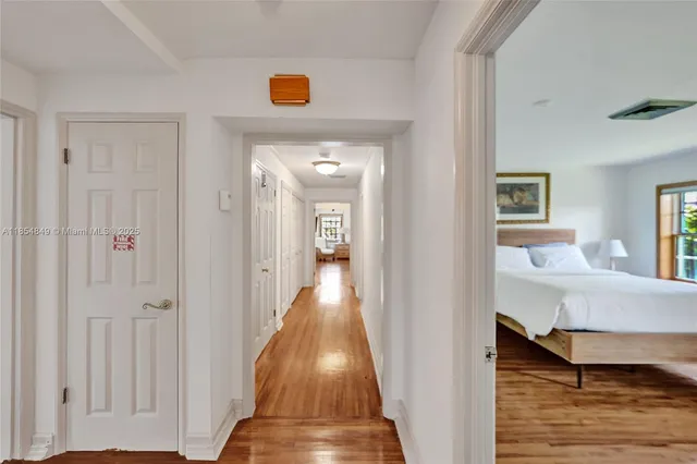 a bathroom with a shower sink and mirror