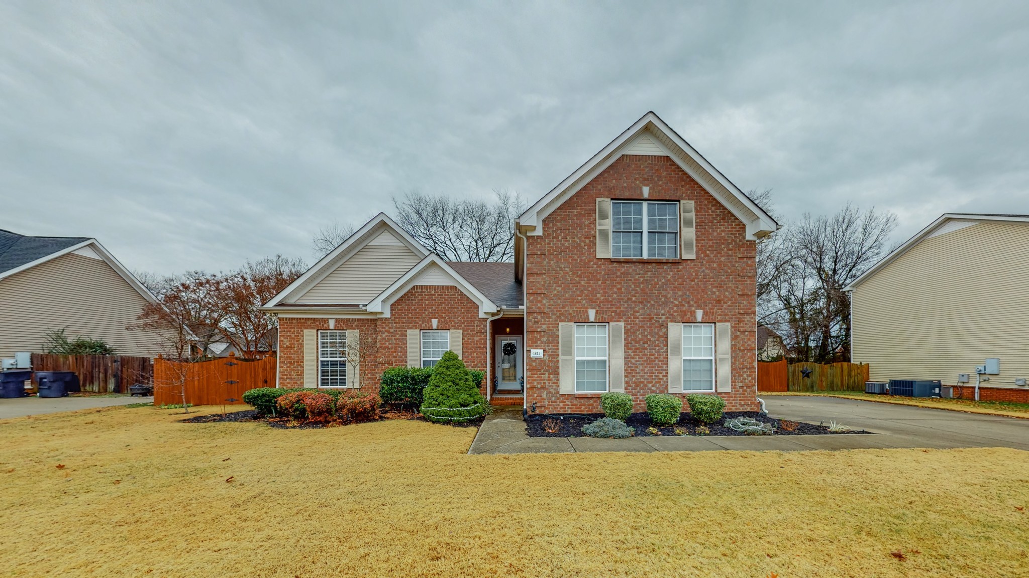 1815 Potters Court Murfreesboro, TN 37128 - Photo 1 of 49 a front view of a house with a yard and garage
