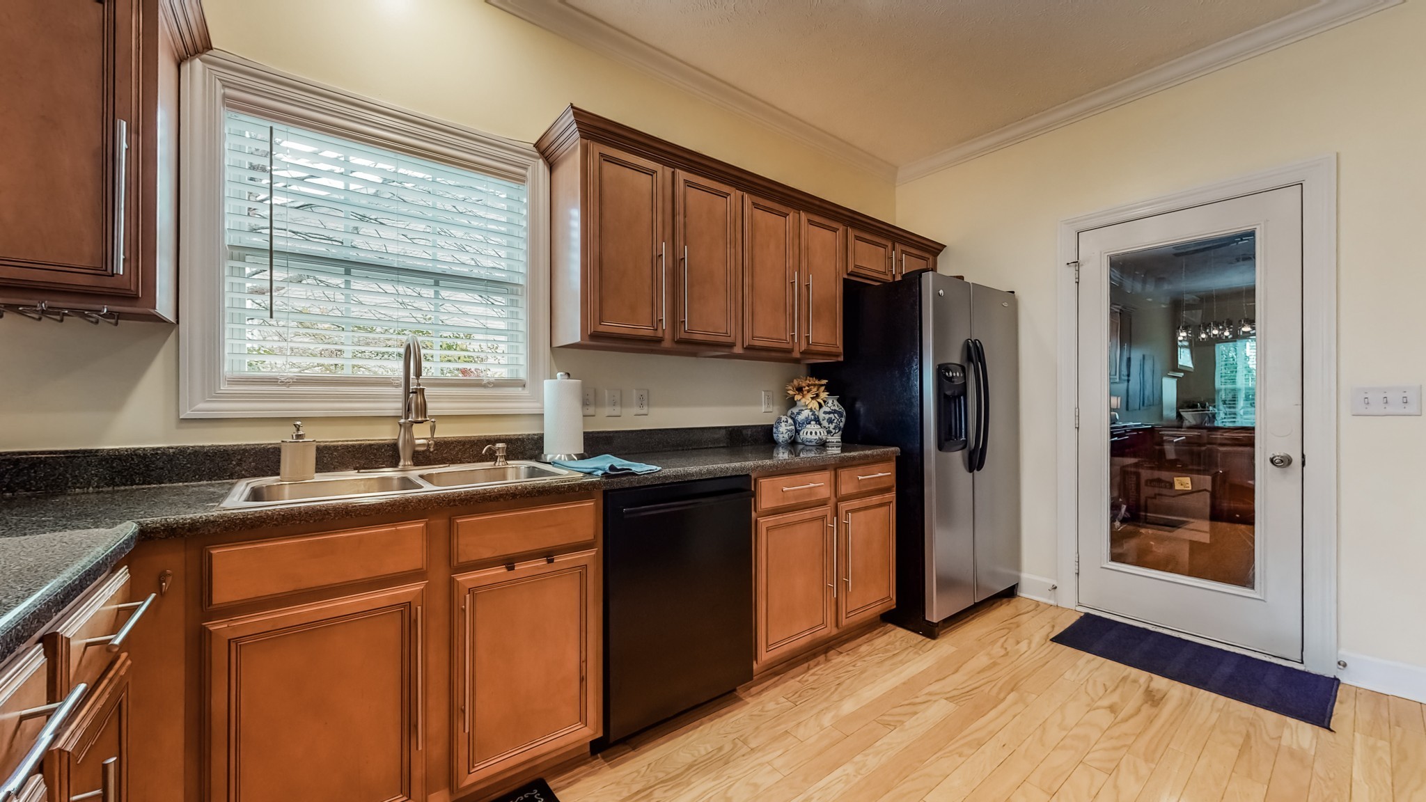 1815 Potters Court Murfreesboro, TN 37128 - Photo 19 of 49 a kitchen with granite countertop a refrigerator stove top oven and sink