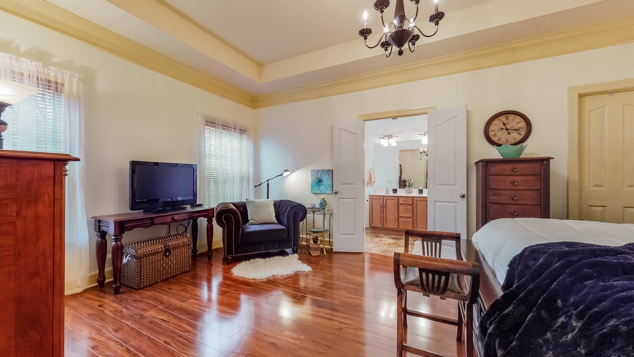 1815 Potters Court Murfreesboro, TN 37128 - Photo 20 of 49 a living room with furniture a wooden floor and a large window