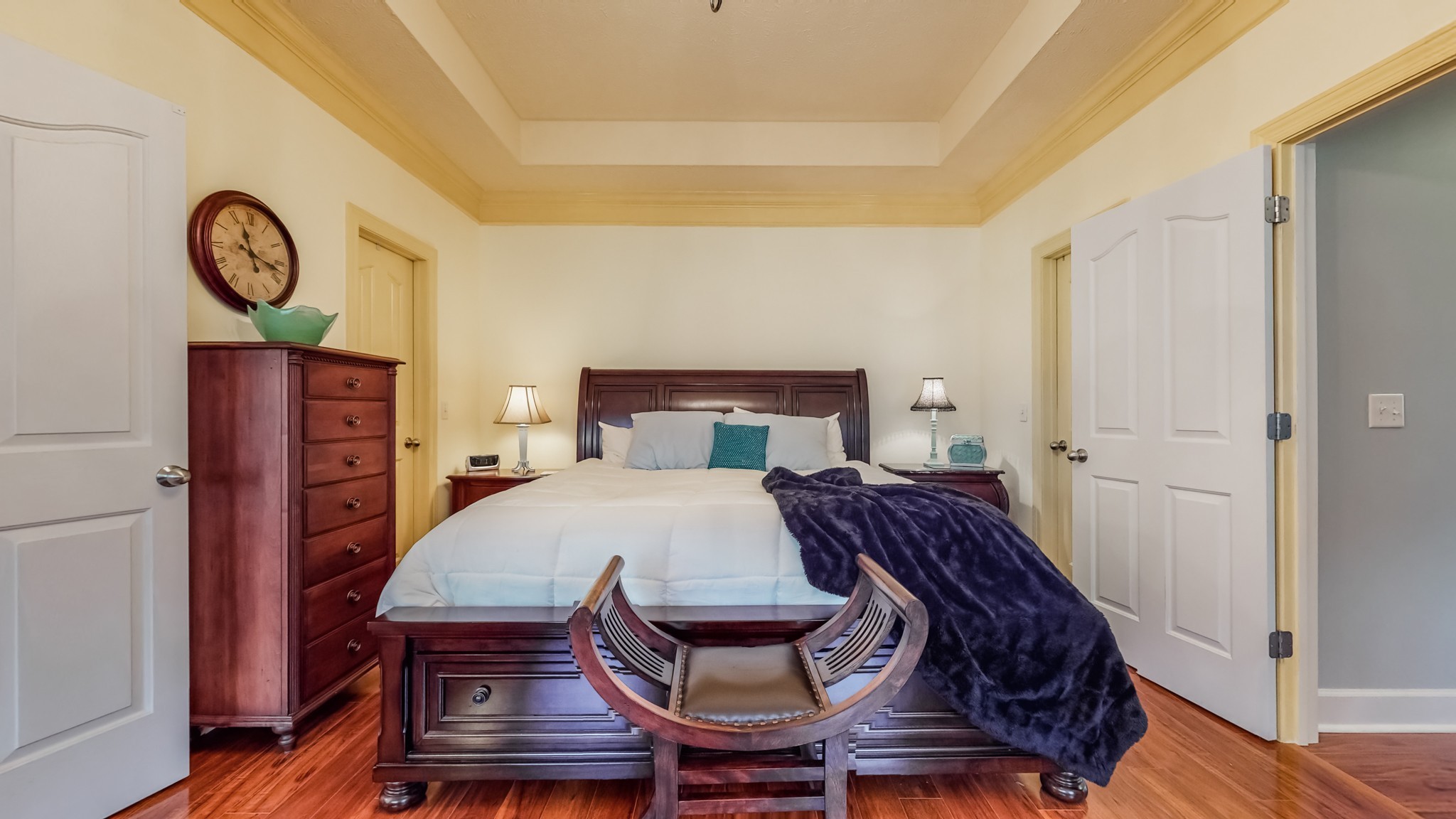 1815 Potters Court Murfreesboro, TN 37128 - Photo 22 of 49 a bedroom with a bed a mirror and a table