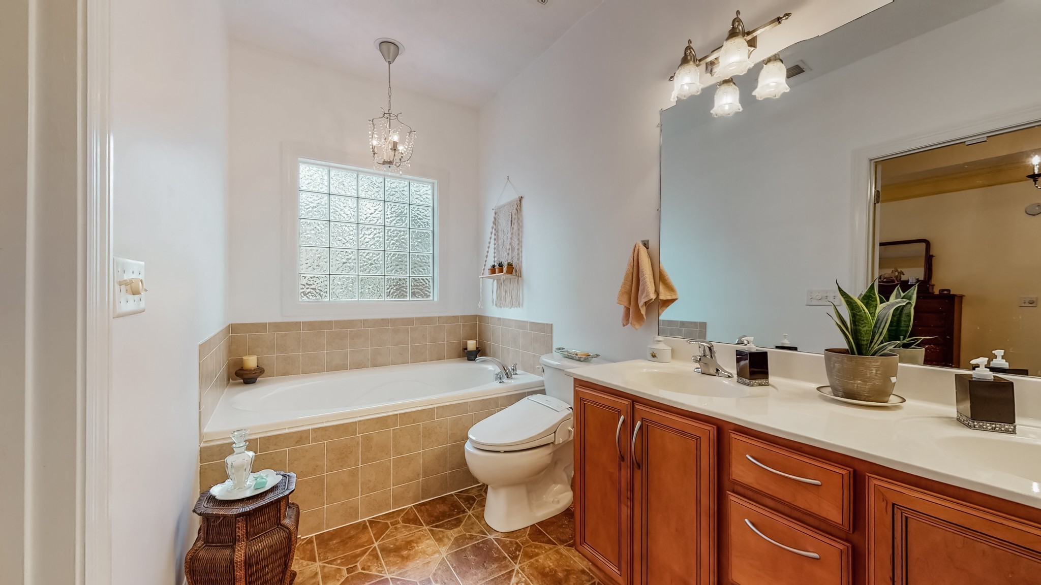 1815 Potters Court Murfreesboro, TN 37128 - Photo 24 of 49 a bathroom with a sink a toilet a mirror and shower