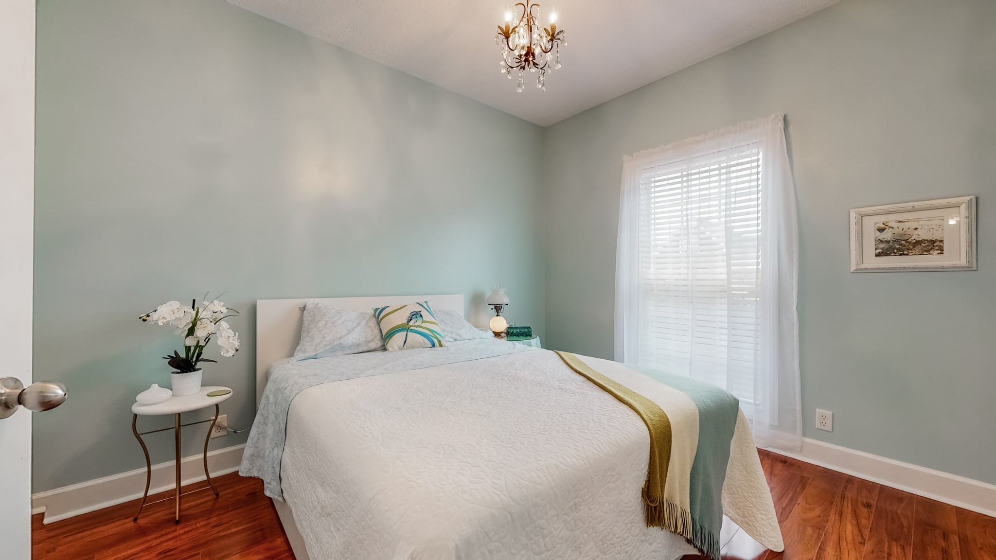 1815 Potters Court Murfreesboro, TN 37128 - Photo 26 of 49 a bedroom with a bed chandelier and a window