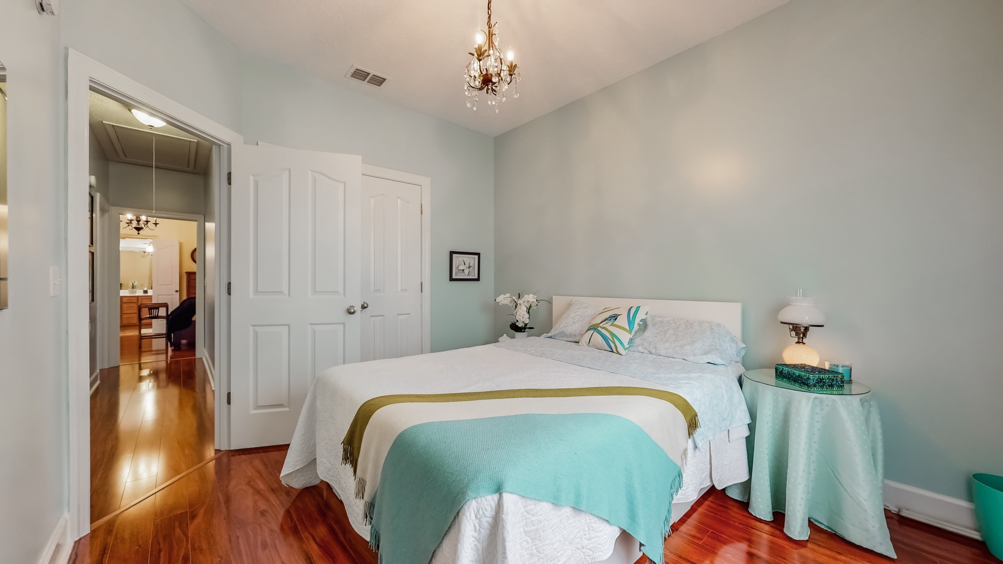 1815 Potters Court Murfreesboro, TN 37128 - Photo 27 of 49 a bedroom with a bed and wooden floor