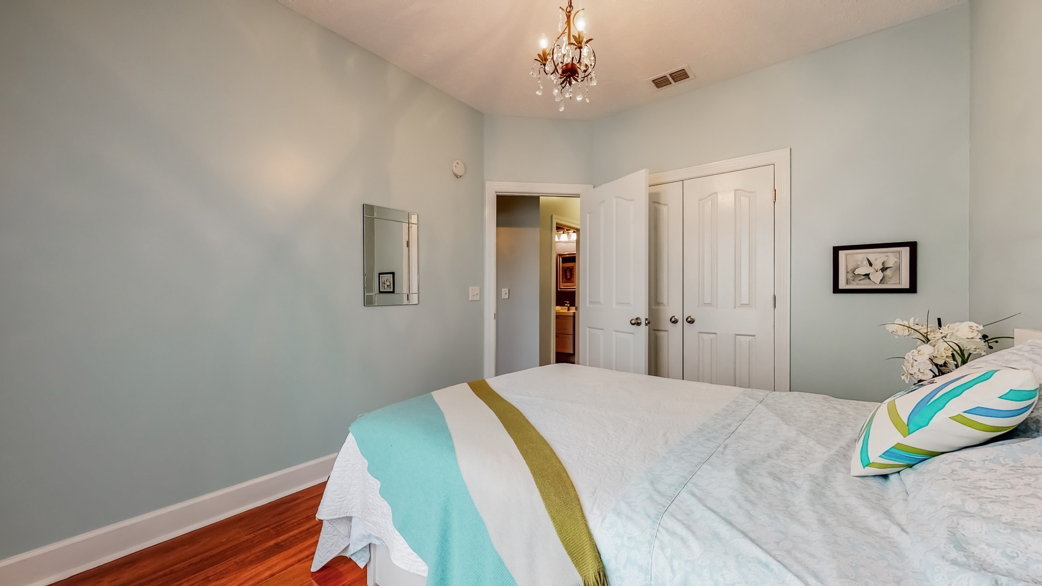 1815 Potters Court Murfreesboro, TN 37128 - Photo 28 of 49 a bedroom with a bed ceiling fan and a wooden floor
