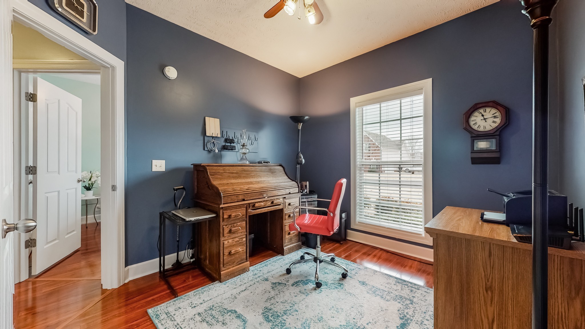 1815 Potters Court Murfreesboro, TN 37128 - Photo 30 of 49 a view of a workspace with furniture and a window