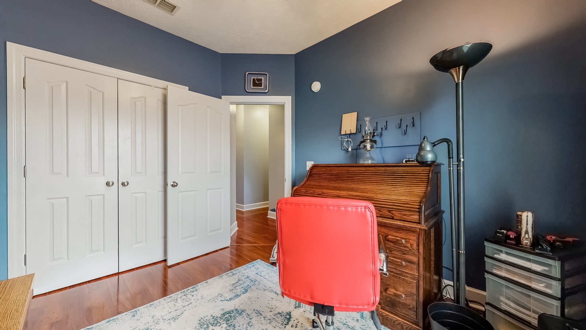 1815 Potters Court Murfreesboro, TN 37128 - Photo 31 of 49 a bedroom with a bed and a dresser