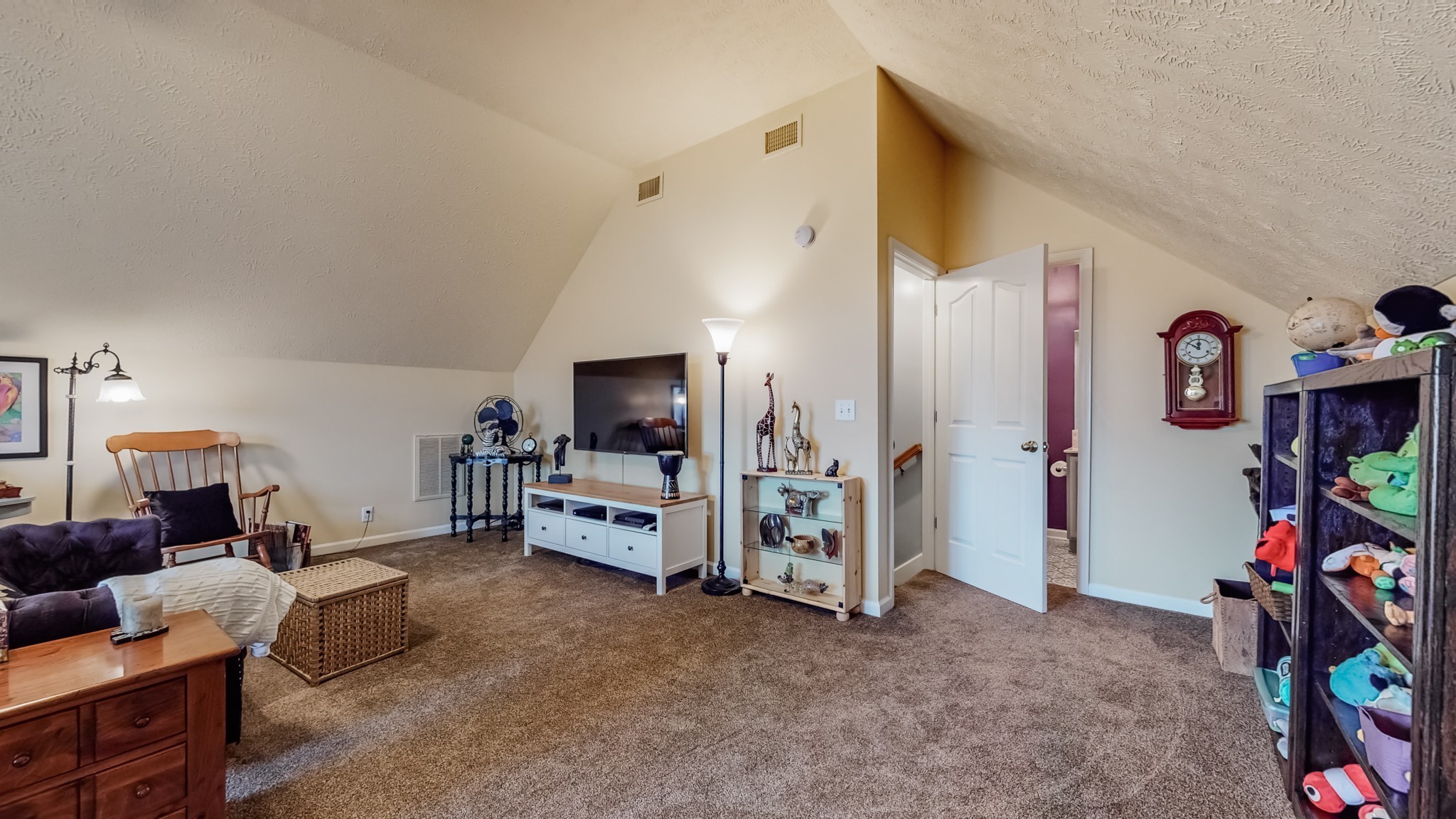 1815 Potters Court Murfreesboro, TN 37128 - Photo 36 of 49 a living room with furniture and a flat screen tv