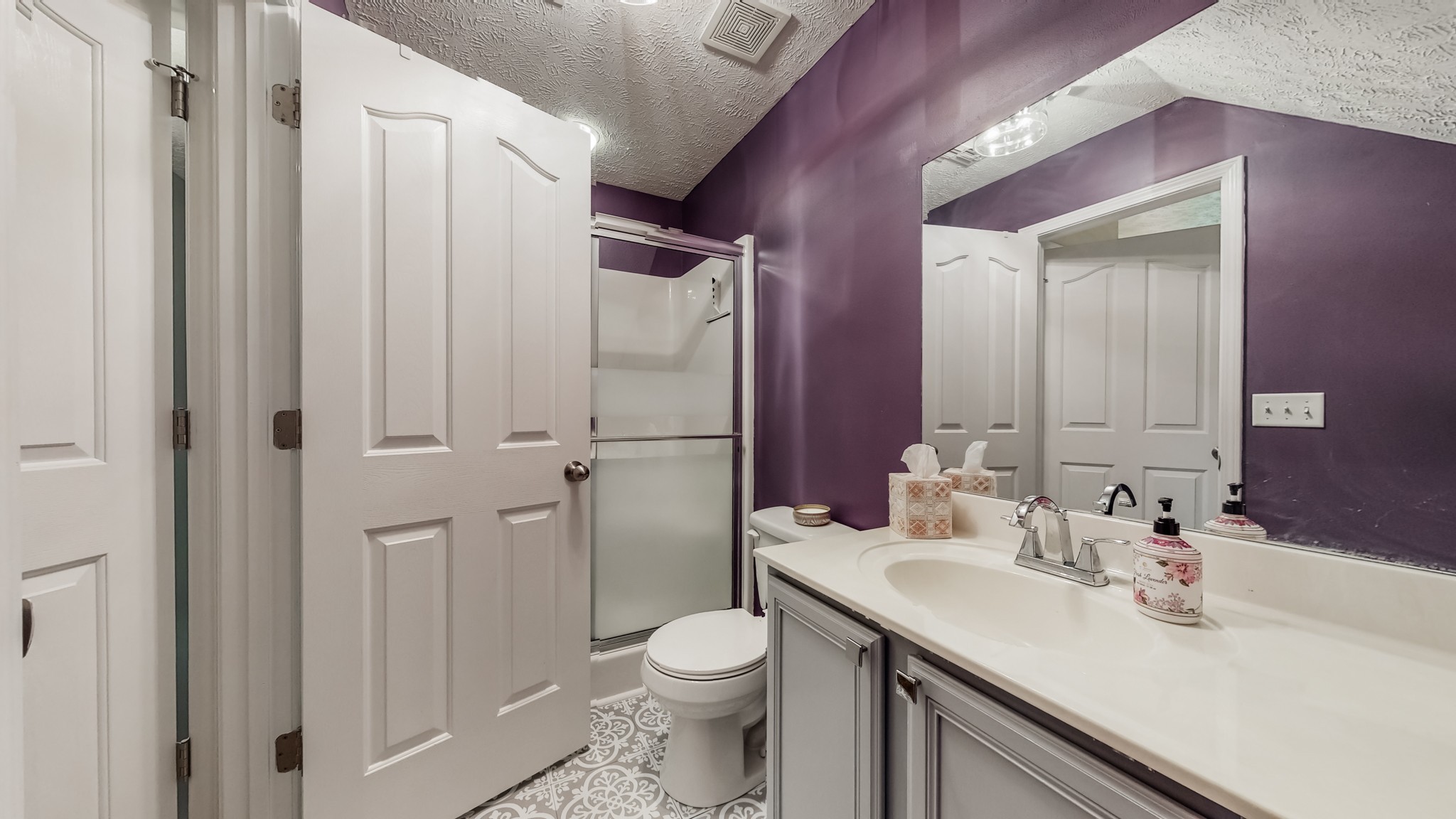 1815 Potters Court Murfreesboro, TN 37128 - Photo 39 of 49 a bathroom with a sink a toilet and shower