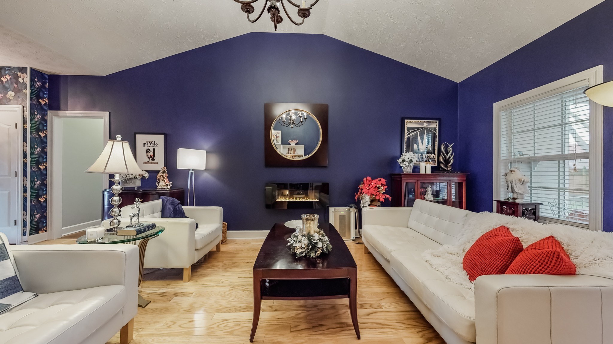 1815 Potters Court Murfreesboro, TN 37128 - Photo 10 of 49 a living room with furniture and a wall painting