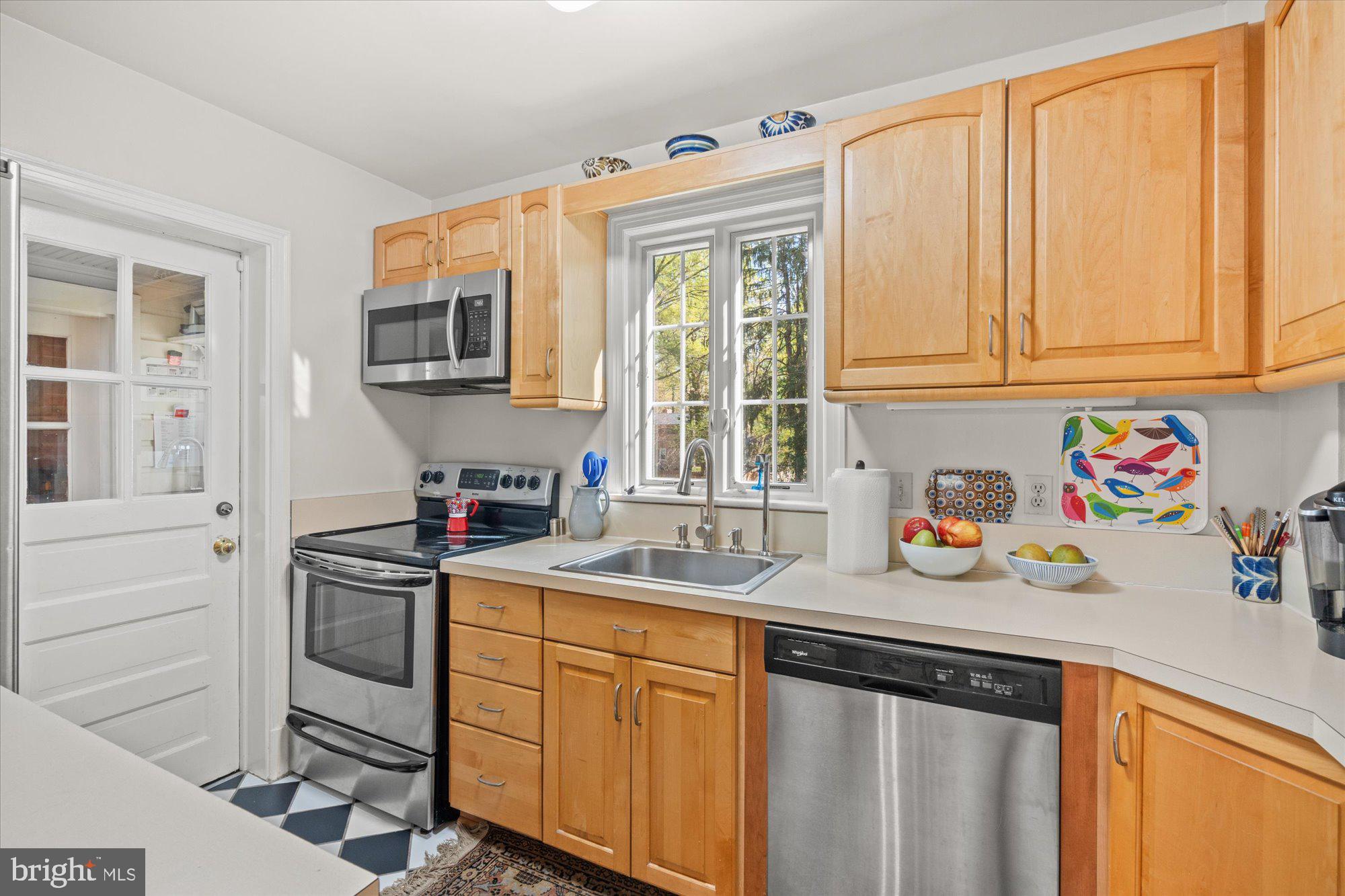 4001 Franconia Road Alexandria, VA 22310 - Photo 11 of 40 a kitchen with stainless steel appliances a sink stove and cabinets