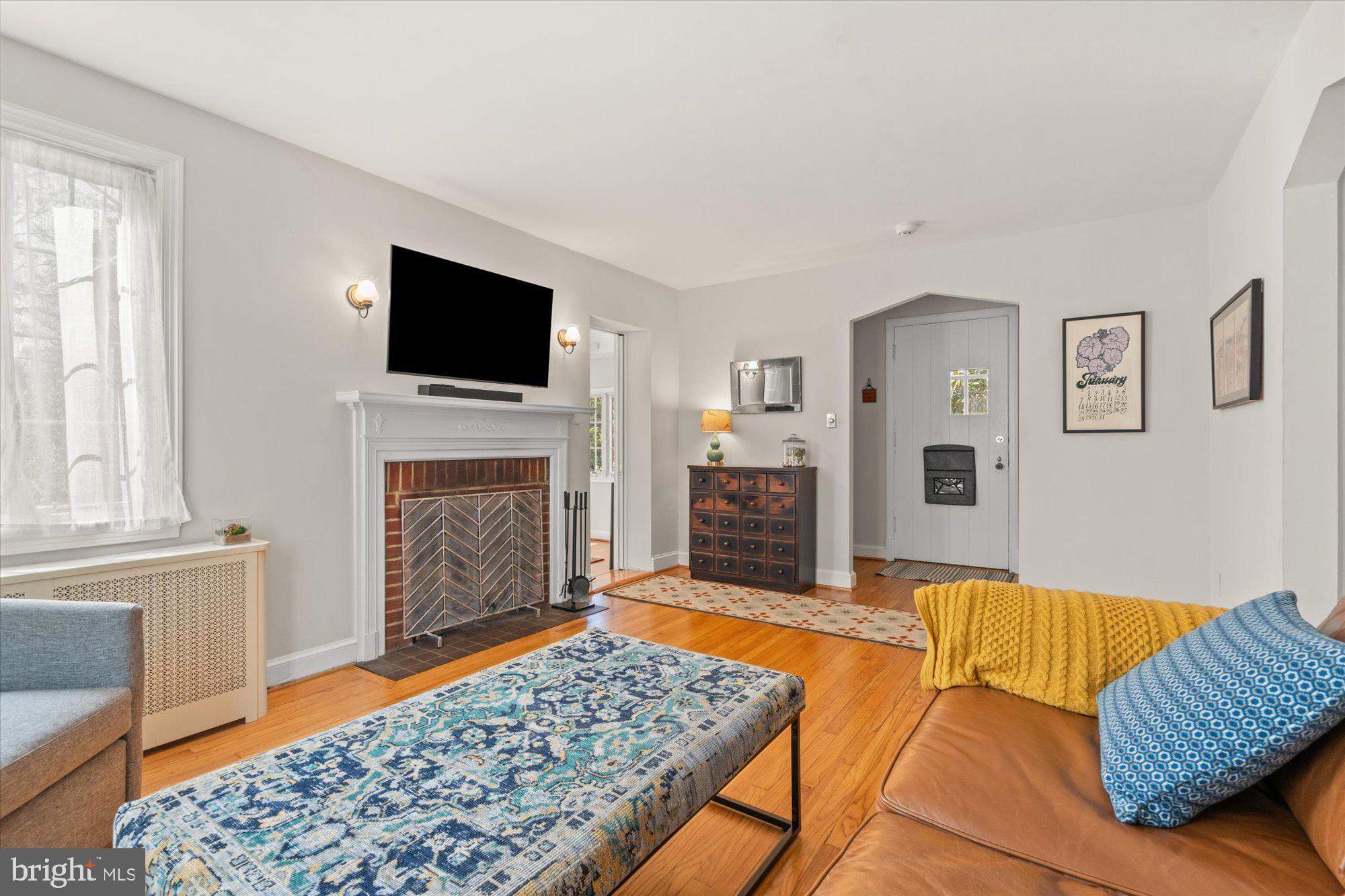 4001 Franconia Road Alexandria, VA 22310 - Photo 5 of 40 a living room with furniture rug and fireplace