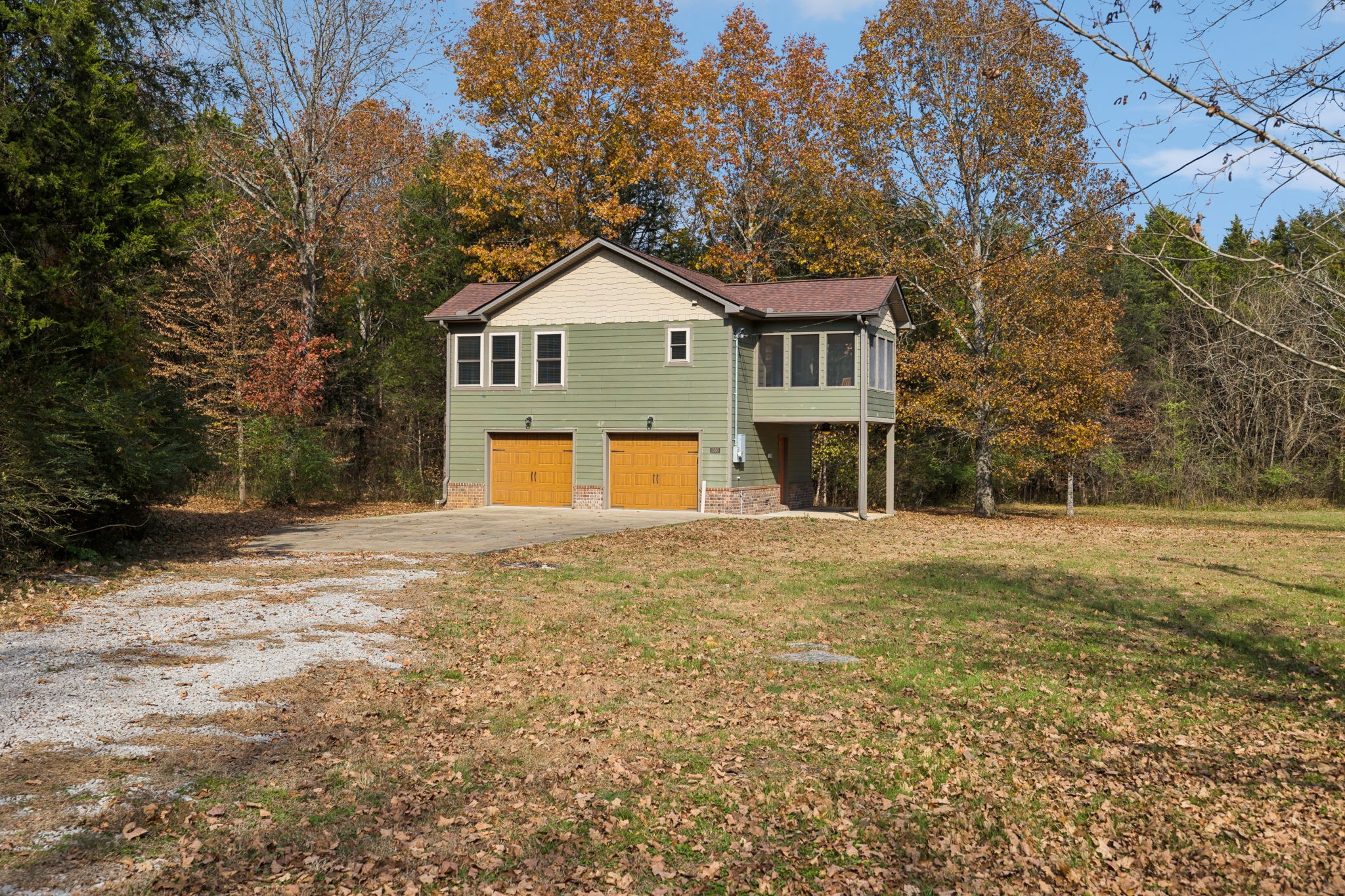 1560 River Road Chapel Hill, TN 37034 - Photo 31 of 80 a front view of a house with a yard and garage