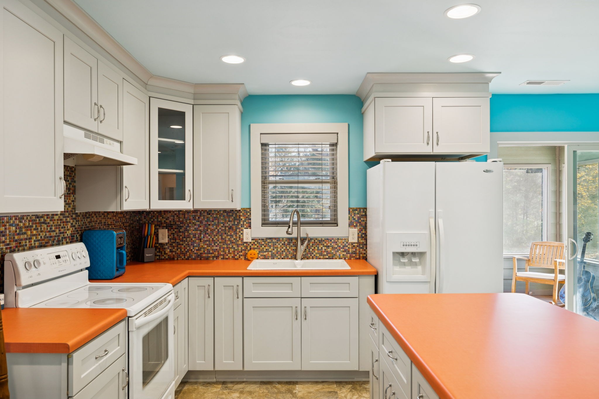 1560 River Road Chapel Hill, TN 37034 - Photo 40 of 80 a kitchen that has a sink a stove and a refrigerator