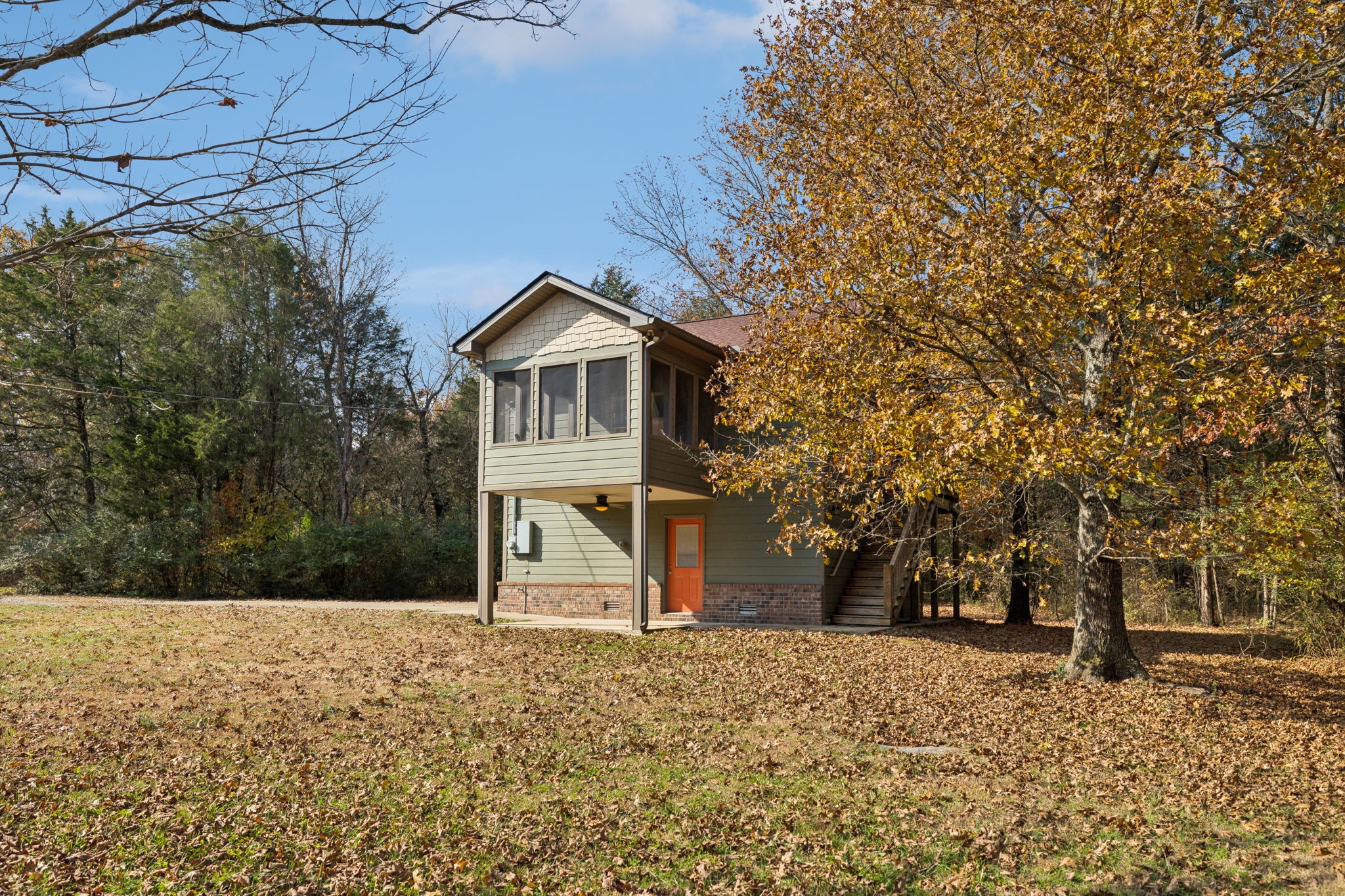1560 River Road Chapel Hill, TN 37034 - Photo 9 of 80 a front view of a house with a yard