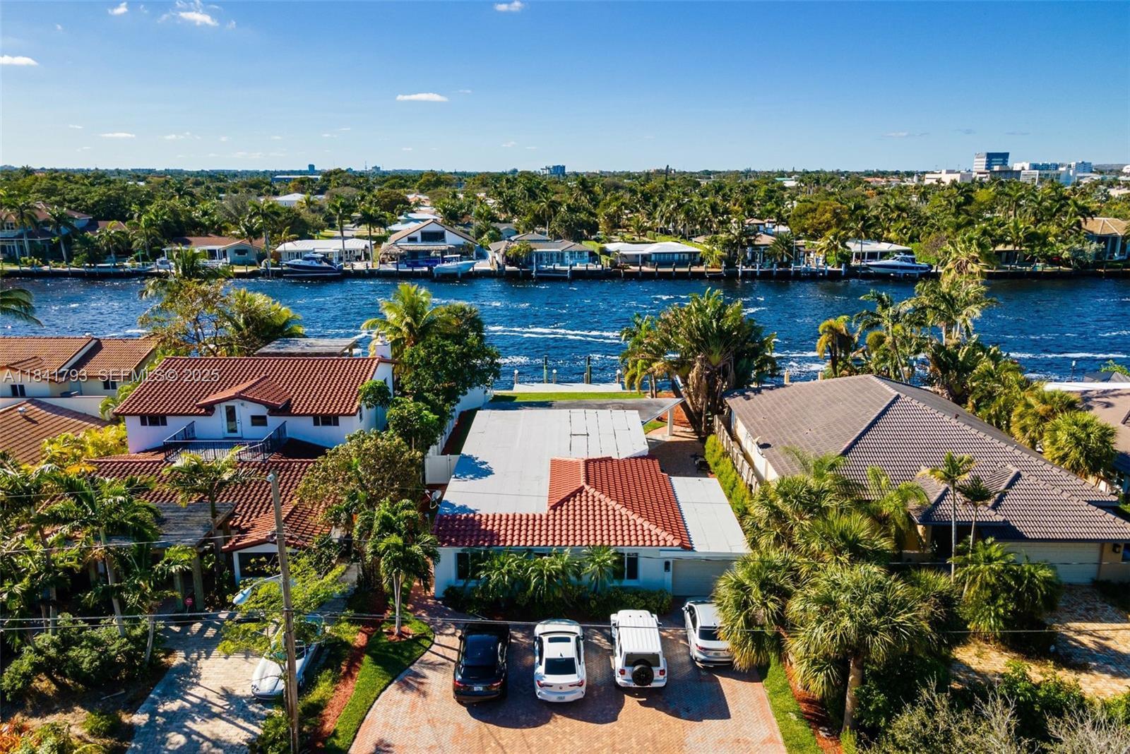 517 South Riverside Drive Pompano Beach, FL 33062 - Photo 18 of 21 an aerial view of a house with lake view