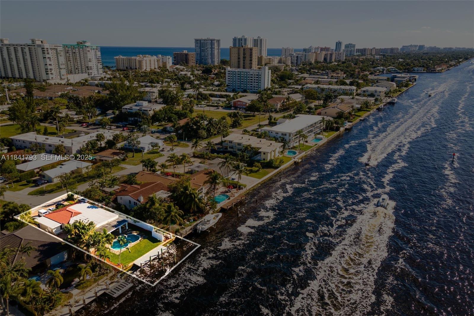517 South Riverside Drive Pompano Beach, FL 33062 - Photo 21 of 21 an aerial view of residential houses with outdoor space