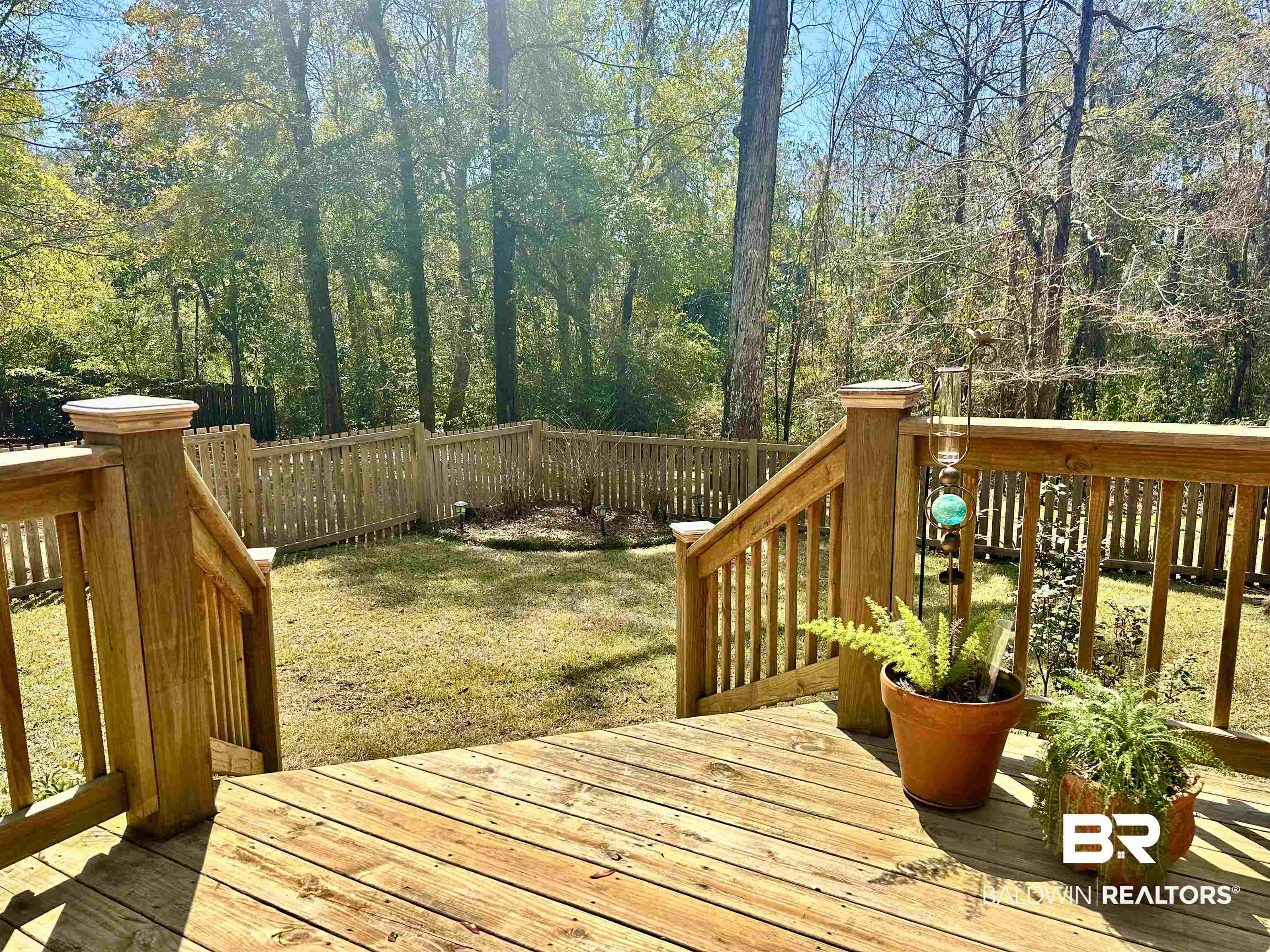 148 Brooks Boulevard Brewton, AL 36426 - Photo 43 of 45 Deck featuring a wooded view and fence