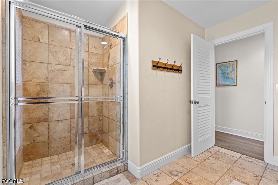 5304 Ladyfinger Lake Road Sanibel, FL 33957 - Photo 25 of 48 a bathroom with a shower