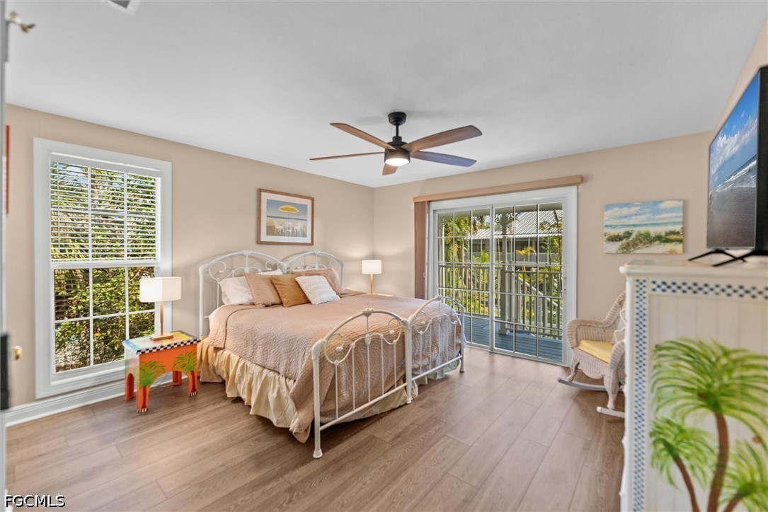 5304 Ladyfinger Lake Road Sanibel, FL 33957 - Photo 26 of 48 a bed room with a bed and a window