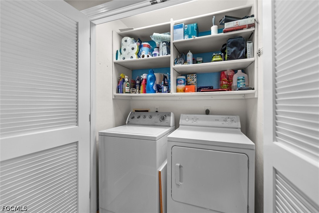 5304 Ladyfinger Lake Road Sanibel, FL 33957 - Photo 28 of 48 a utility room with dryer and washer