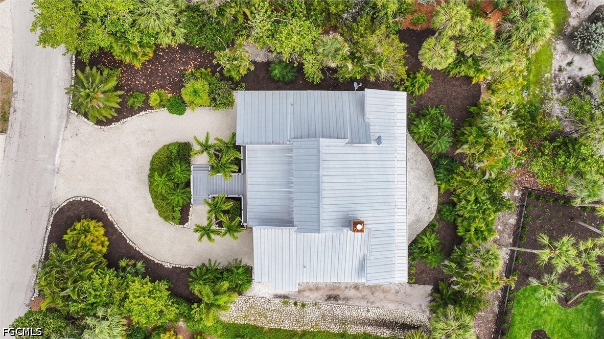 5304 Ladyfinger Lake Road Sanibel, FL 33957 - Photo 41 of 48 an aerial view of a house with garden space and swimming pool