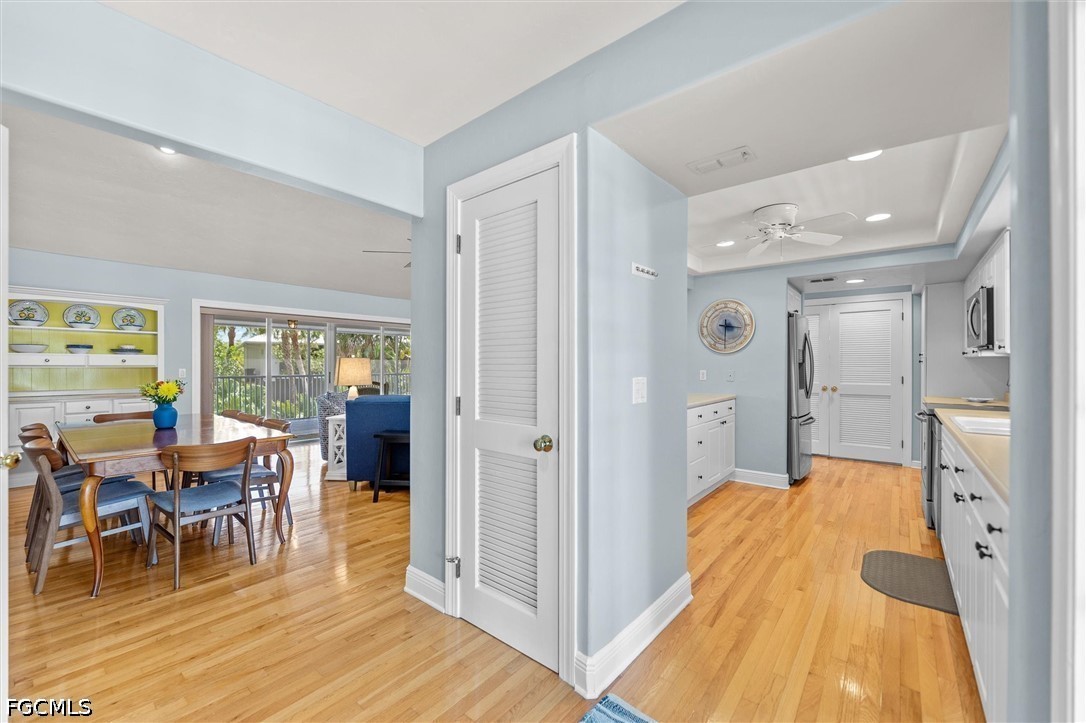 5304 Ladyfinger Lake Road Sanibel, FL 33957 - Photo 7 of 48 a spacious bedroom with a bed and glass door