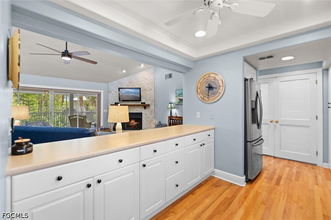 5304 Ladyfinger Lake Road Sanibel, FL 33957 - Photo 9 of 48 a spacious bathroom with a large mirror and a sink