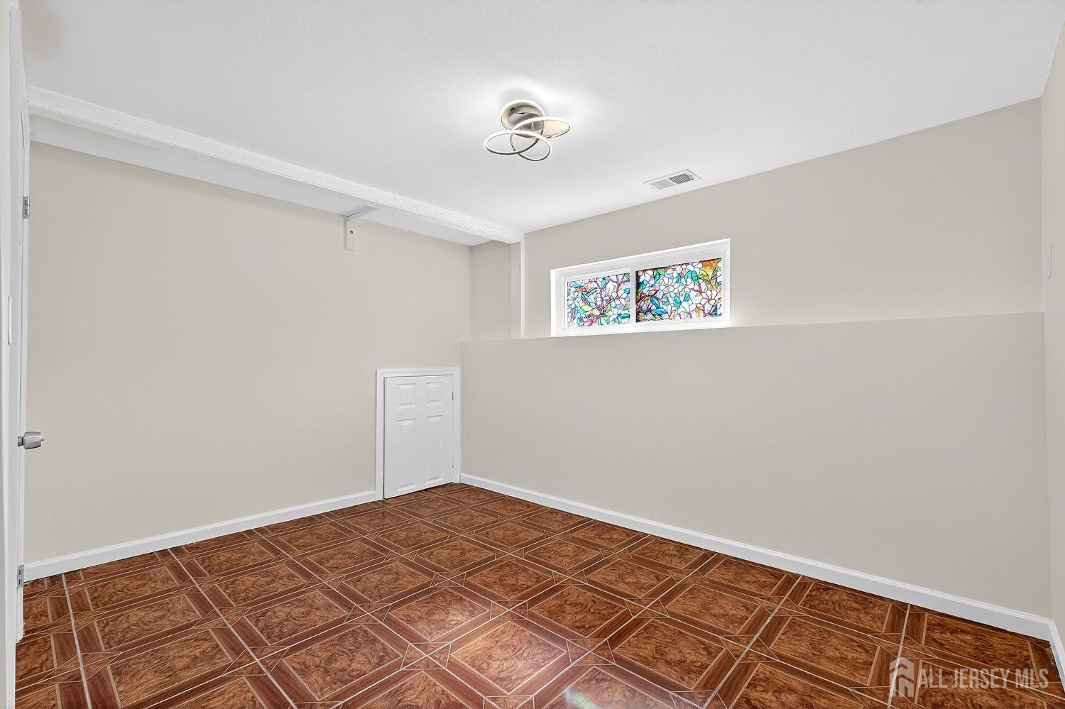 124 Cindy Court Middlesex, NJ 08846 - Photo 19 of 27 a view of a room with wooden floor