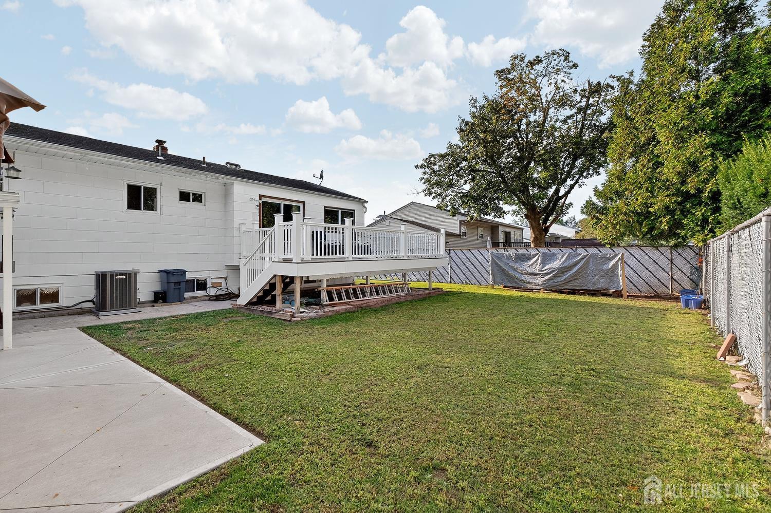 124 Cindy Court Middlesex, NJ 08846 - Photo 26 of 27 a view of a house with backyard and sitting area
