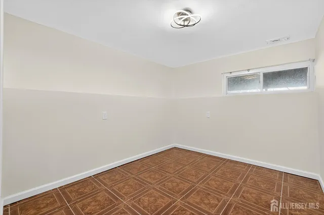 an empty room with a workbench