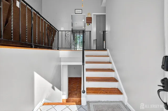 a view of entryway with a front door