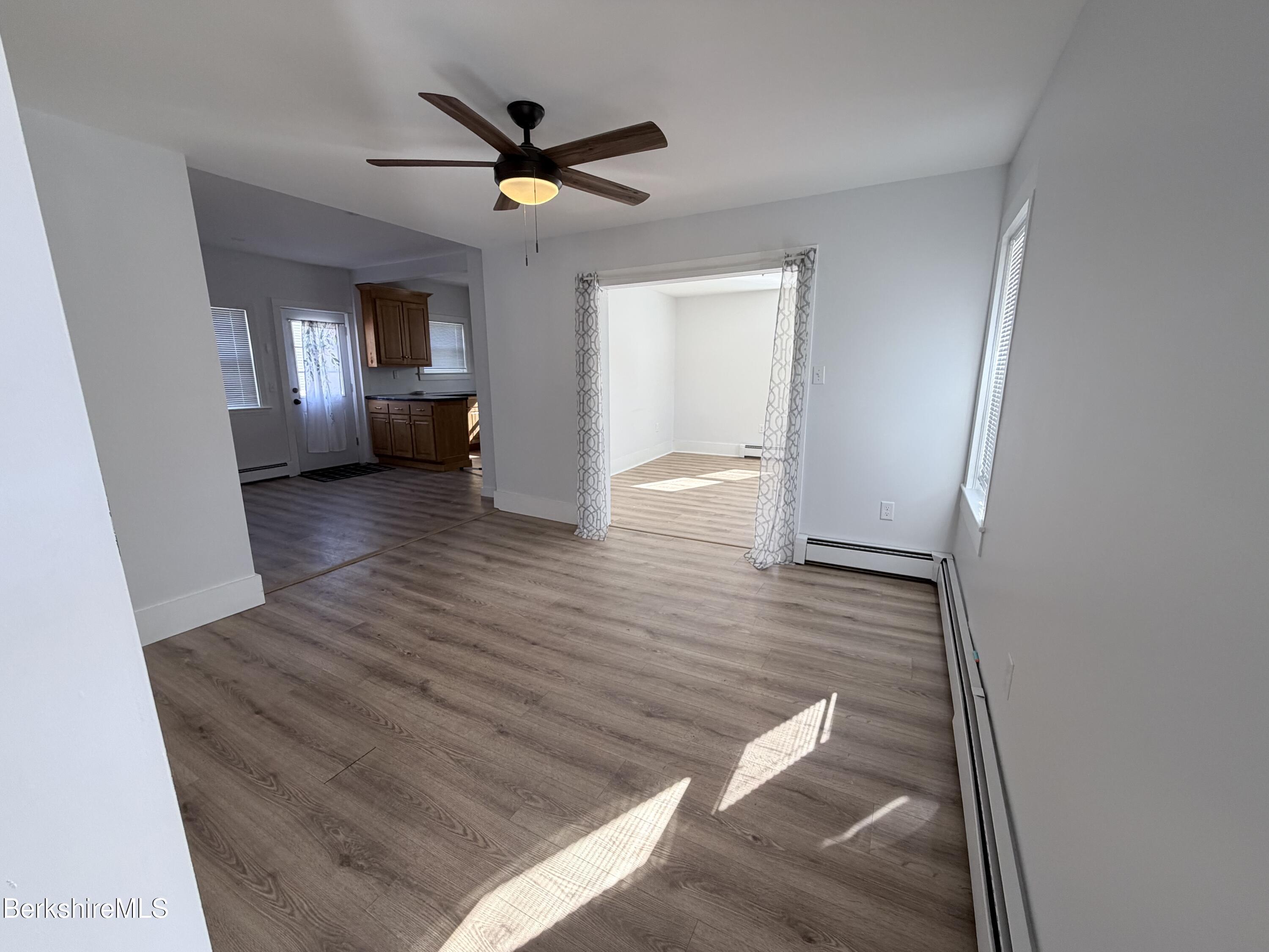 50 Temple Street Adams, MA 01220 - Photo 3 of 14 a view of empty room with wooden floor