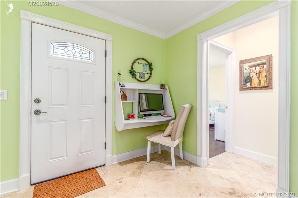 4780 Southeast Glen Ridge Trail Stuart, FL 34997 - Photo 11 of 31 a view of a hallway with elevator