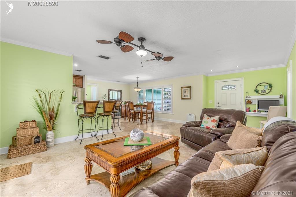 4780 Southeast Glen Ridge Trail Stuart, FL 34997 - Photo 13 of 31 a living room with furniture
