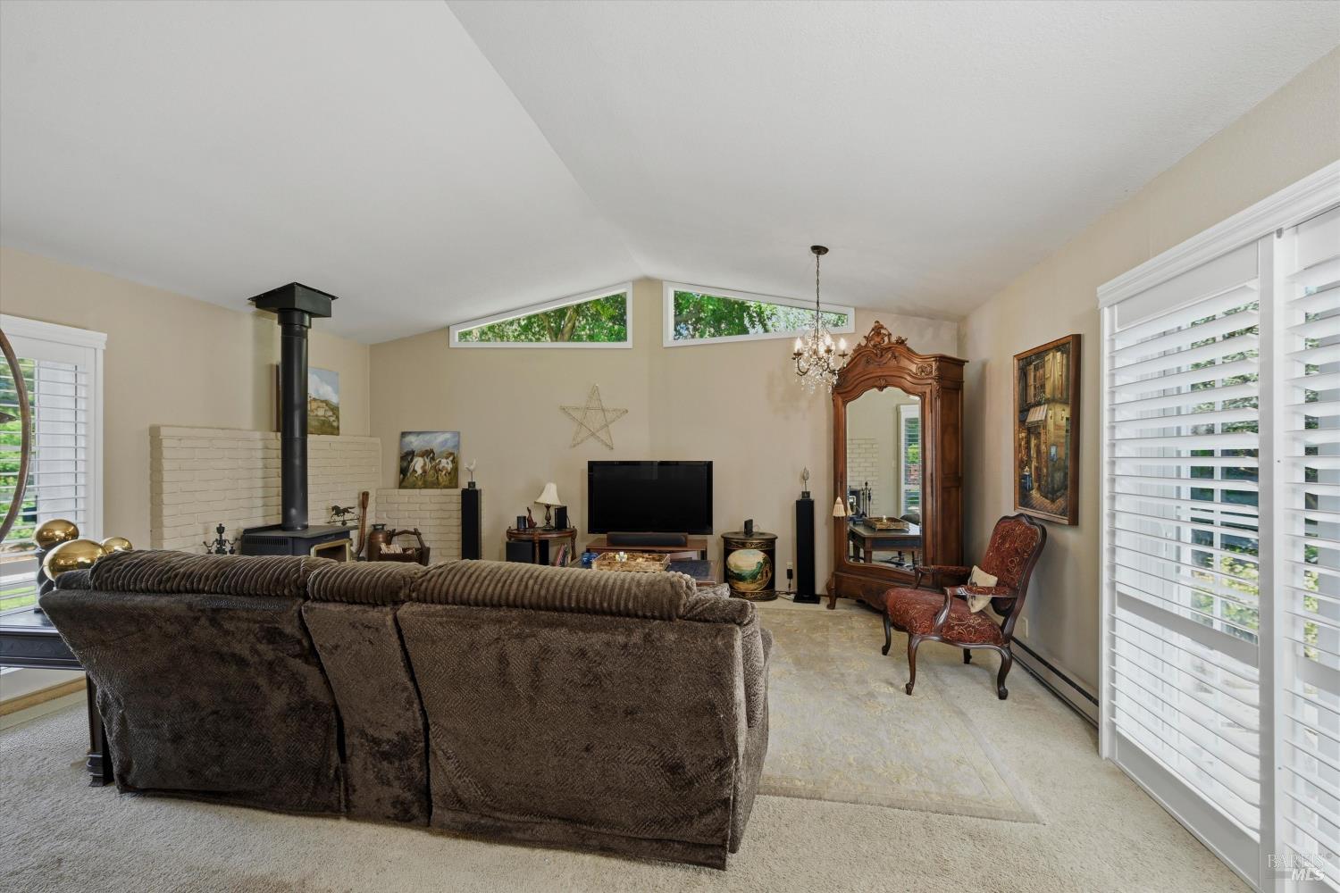 4320 Roblar Road Petaluma, CA 94952 - Photo 26 of 59 Cozy family room with wood burning stove and sliding glass doors leading to the fenced back yard