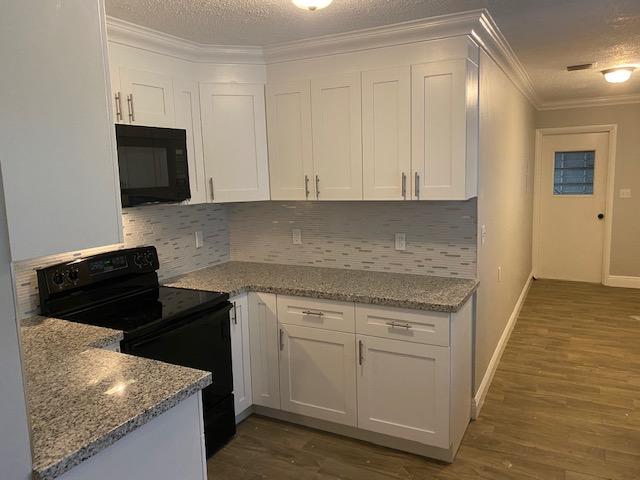 2256 Bacom Point Road Pahokee, FL 33476 - Photo 2 of 6 91A23B4D-05F4-4988-BC4A-E218F6A7F153