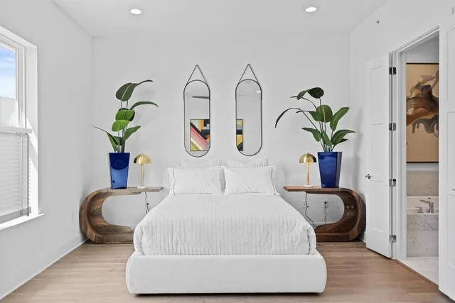 a bedroom with a bed and furniture