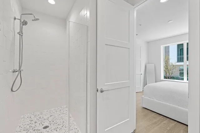 a bathroom with a sink mirror and vanity