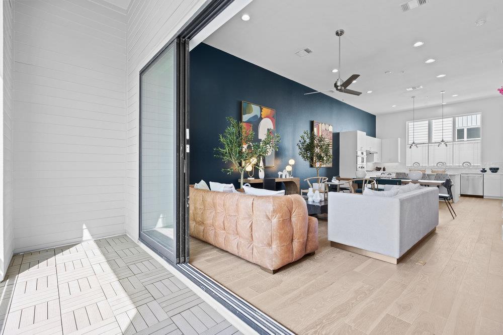 2805 McCurdy Street, Unit 4 Austin, TX 78723 - Photo 6 of 40 a living room with furniture and a large window