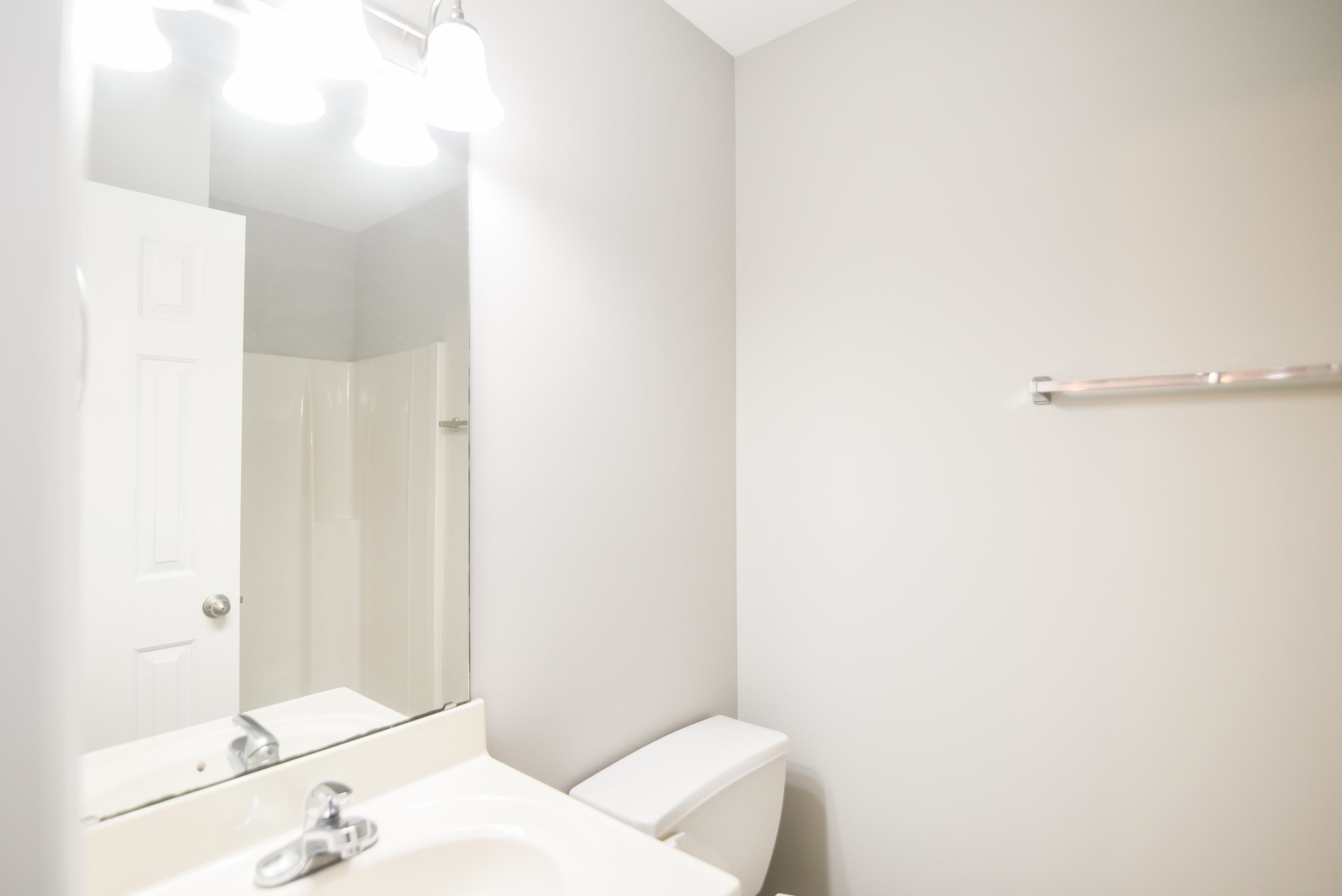 69 Red Lane Raleigh, NC 27606 - Photo 13 of 18 Bedroom #2's en suite bathroom with walk-in shower. Bathroom