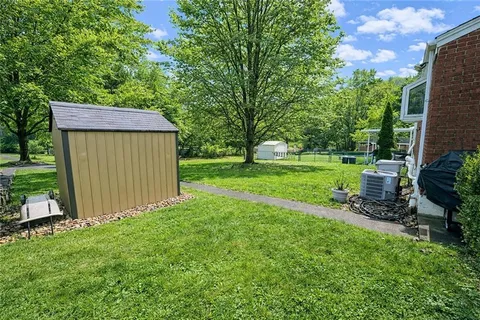 a garden view with a seating space