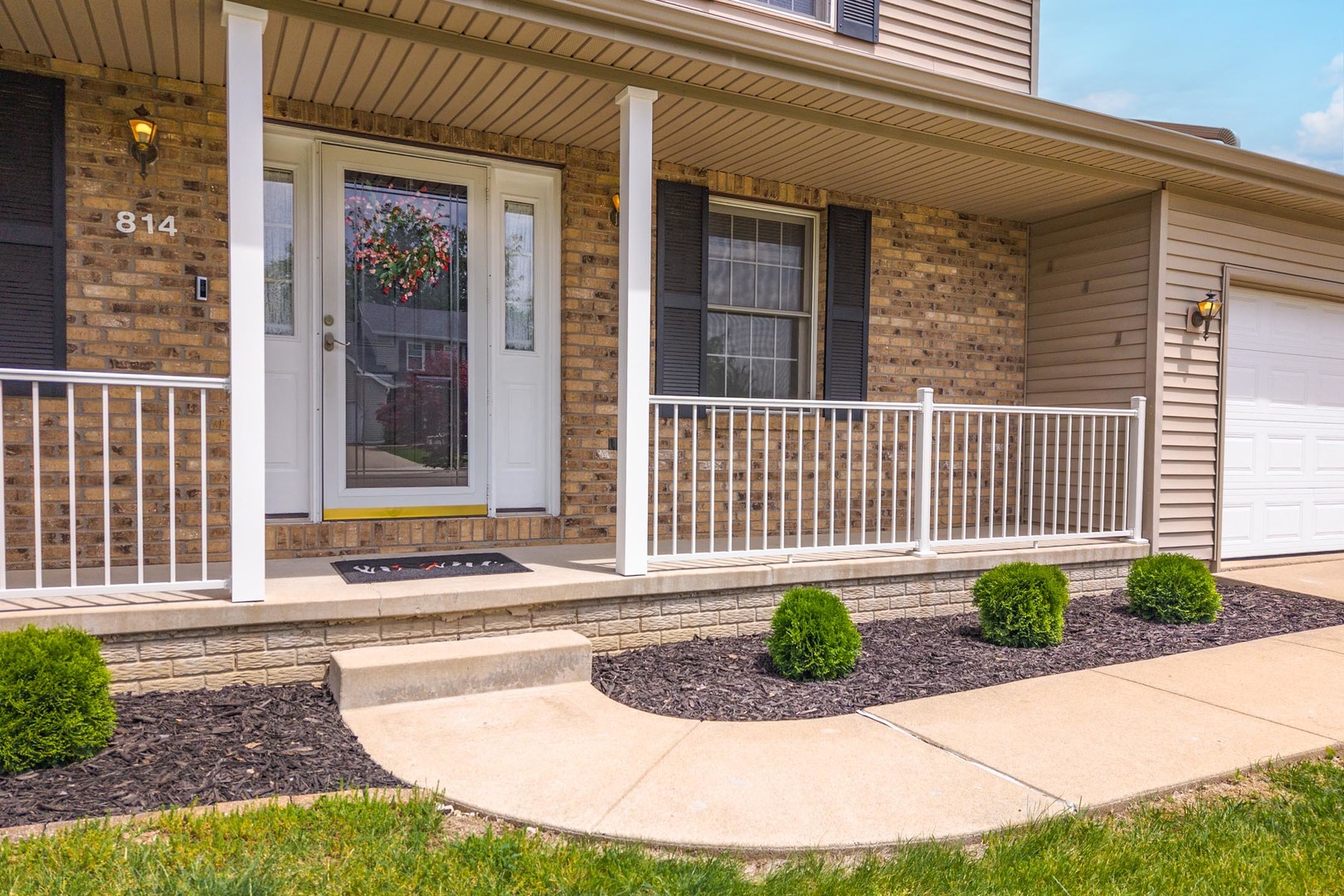 814 Landau Lane Normal, IL 61761 - Photo 4 of 58 a view of a house with a small yard and wooden floor and fence