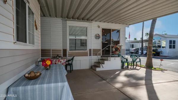 a living room filled with furniture and gym equipment