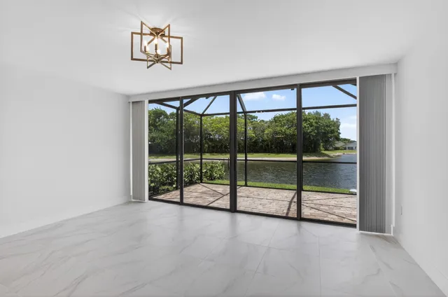 an empty room with sliding door