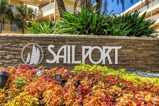 a sign that is on a brick building