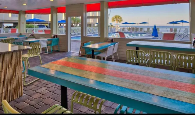 a aerial view of a house with a yard