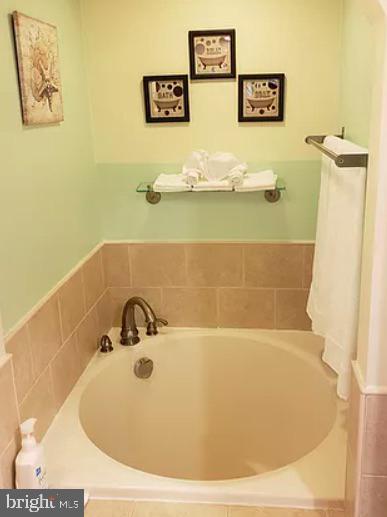 1018 Booth Street Baltimore, MD 21223 - Photo 3 of 6 a bathroom with a tub