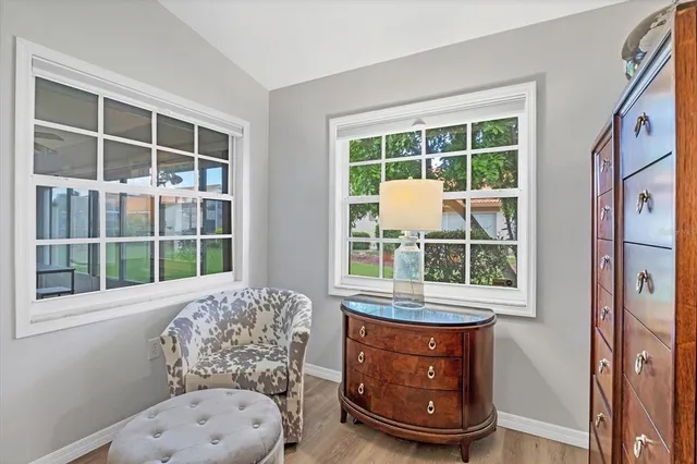 a living room with furniture and a window